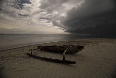 Scenic view of sea against cloudy sky