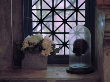 Close-up of flower vase on table