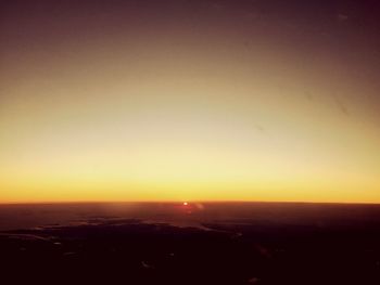 Scenic view of landscape at sunset