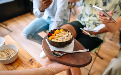 Midsection of man preparing food