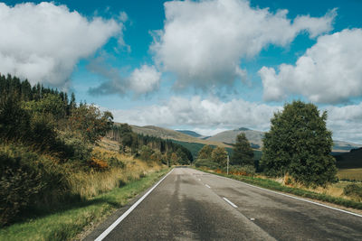 Empty road against sky