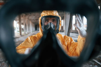 Low angle view of young woman in car