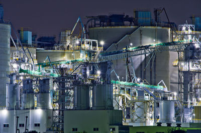 Illuminated factory at night