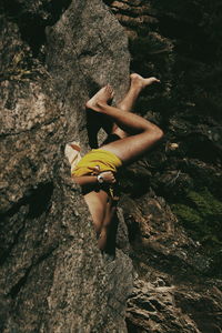 Full length of man lying on rock