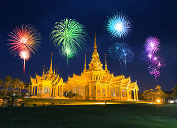 Firework display at night