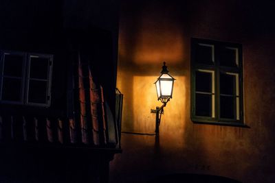 Illuminated street light at night