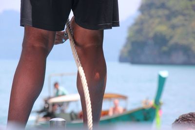 Close-up of man at seaside