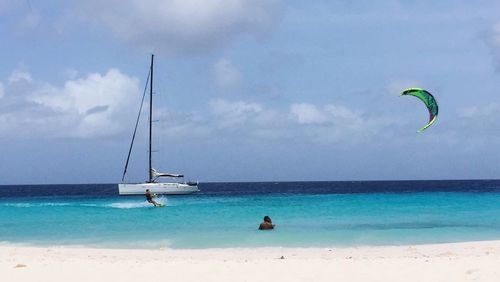 People enjoying on beach