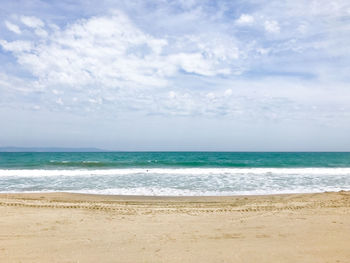 Scenic view of beach against sky