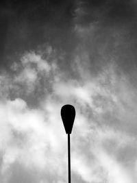 Low angle view of street light against sky