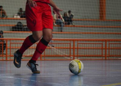 Low angle view of man playing soccer ball