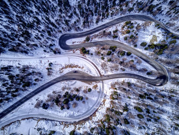 High angle view of light trails on road in winter