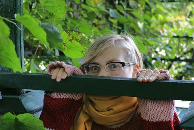 Portrait of girl with plants