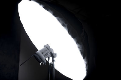 Low angle view of camera against clear sky