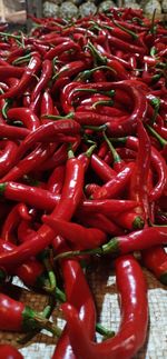 Close-up of red chili peppers for sale in market