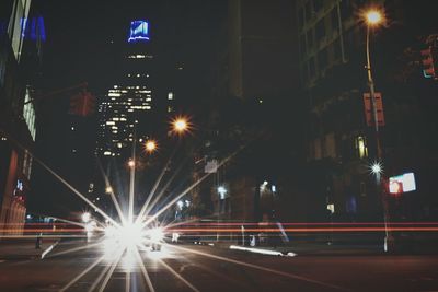 Illuminated street light at night