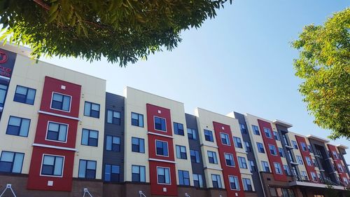 Low angle view of residential building against sky