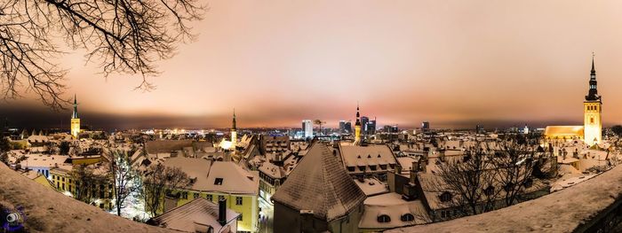 High angle view of buildings against sky during sunset