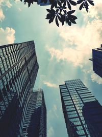 Low angle view of skyscraper against sky