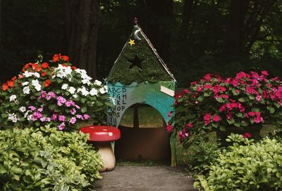 Tent amidst plants on field