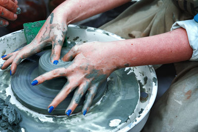 High angle view of man hand in water