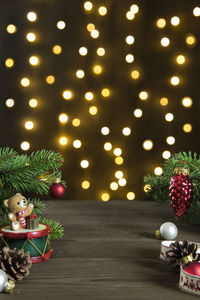 Illuminated christmas tree on table