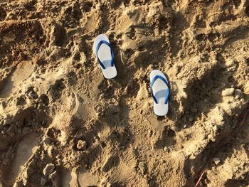 Close-up of footprints on sand