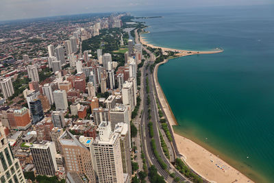 Lake shore drive - high angle view of city by sea against sky