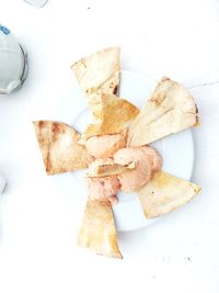Close-up of bread in plate on table