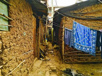 Close-up of clothes drying against building