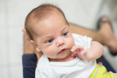 Portrait of cute baby at home