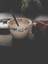 Close-up of hand holding drink