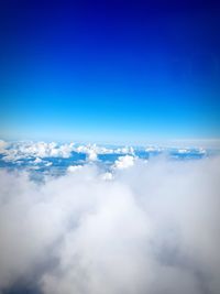 Low angle view of cloudscape against blue sky