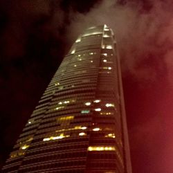 Low angle view of modern building at night