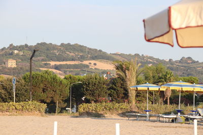 Scenic view of beach against clear sky