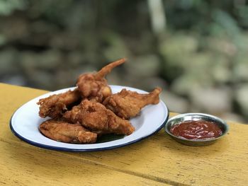 Close-up of food served on table