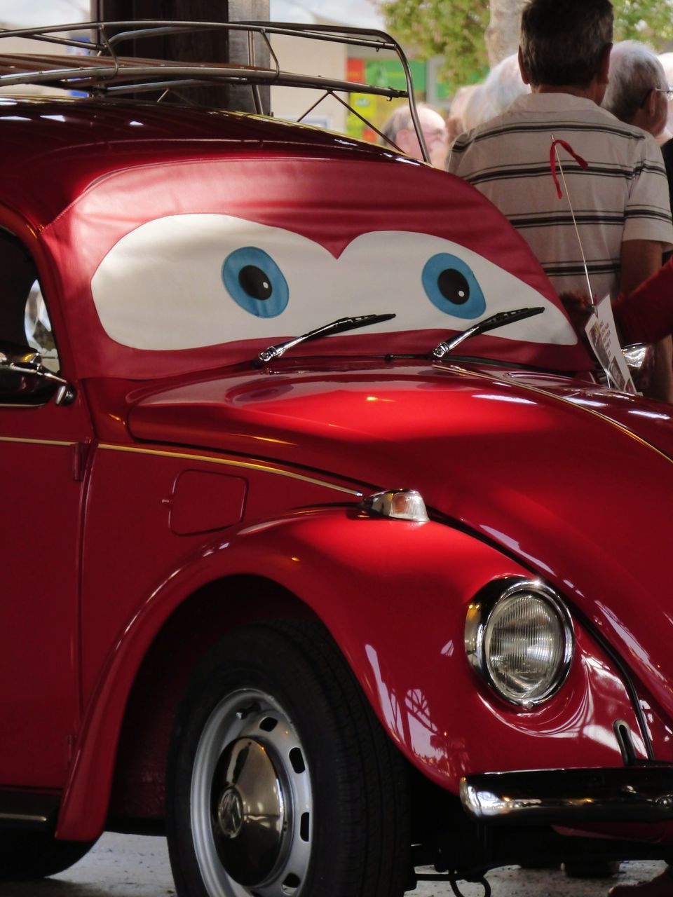 CLOSE-UP OF RED VINTAGE CAR