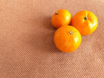 High angle view of orange fruits