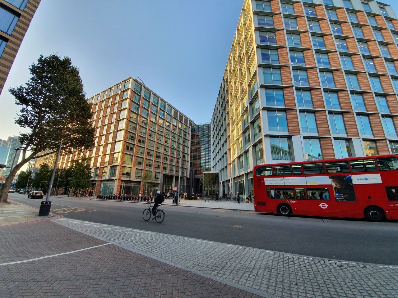 VIEW OF CITY STREET AND MODERN BUILDINGS