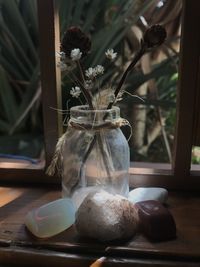 Close-up of flower vase on table