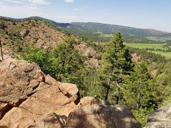 Scenic view of tree mountains against sky