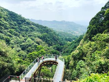 Scenic view of tree mountains against sky