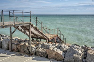 Staircase to the black sea on the fontanka embankment near odessa, ukraine, on a winter day