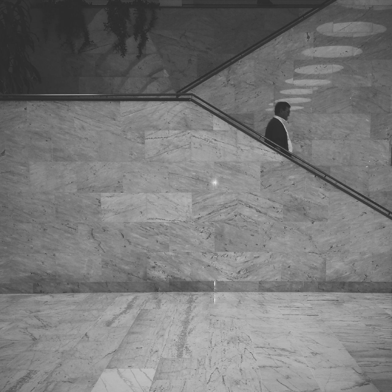 lifestyles, full length, walking, men, leisure activity, person, rear view, standing, high angle view, casual clothing, built structure, steps, architecture, shadow, railing, street, the way forward