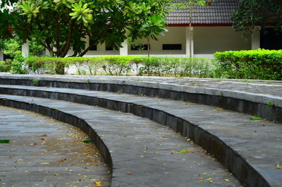 View of garden by pond in park