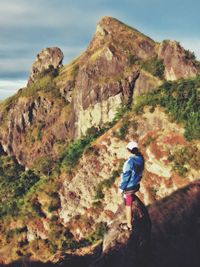 Man standing on cliff