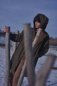 Man standing outdoors during winter