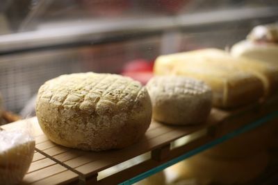 Close-up of cheese in shelf at store