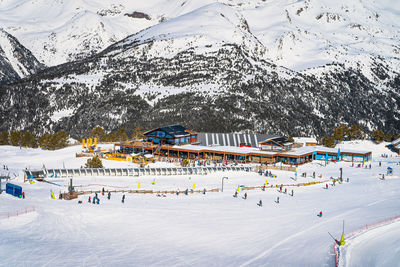 Winter sports and family ski holiday, view on soldeu ski lifts cross centre, andorra