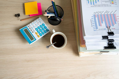 High angle view of coffee cup on table